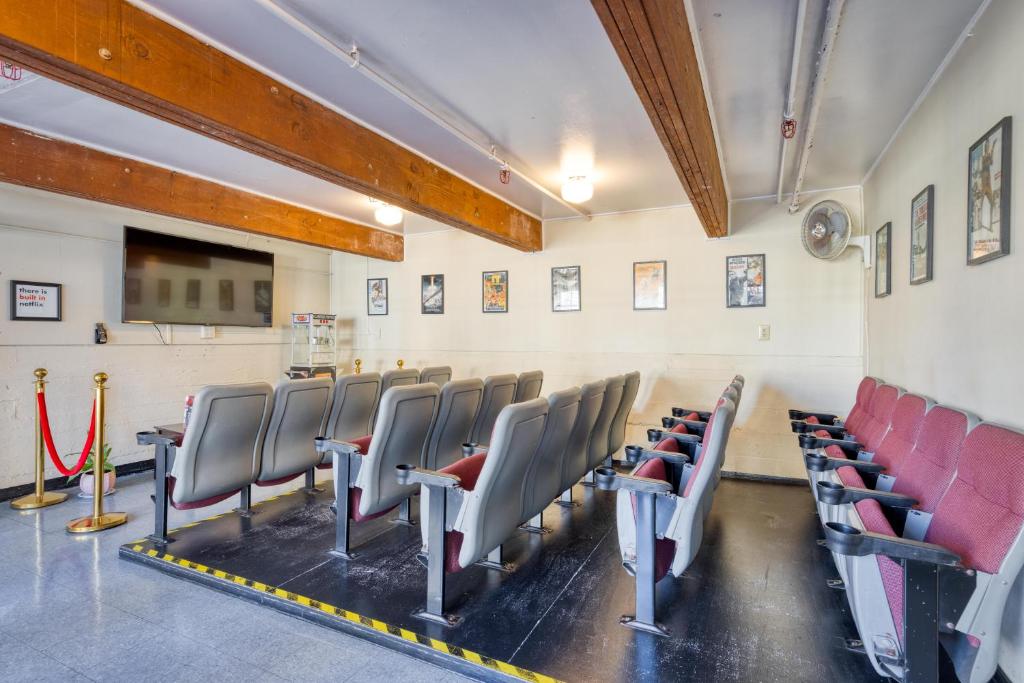a room with a bunch of chairs in it at HI San Francisco Fisherman's Wharf Hostel in San Francisco