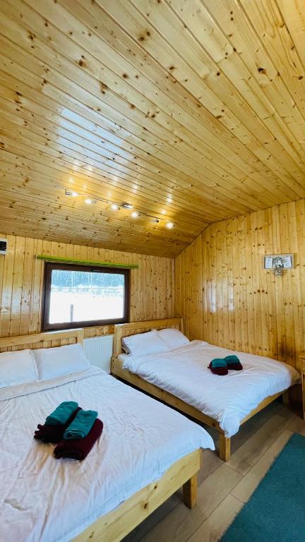 Postel nebo postele na pokoji v ubytování View Piatra Craiului