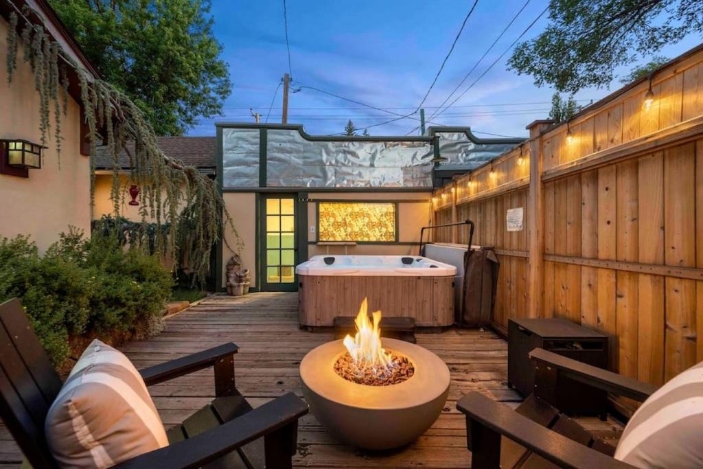 a backyard with a hot tub and a fire pit at Desert Modern Downtown Flagstaff Unit with Hot Tub in Flagstaff