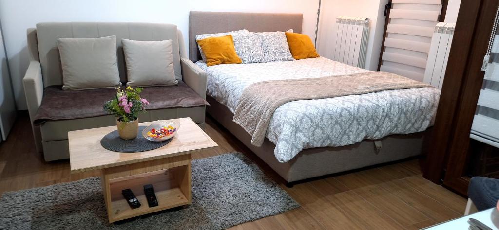 Postel nebo postele na pokoji v ubytování Apartman Dunati