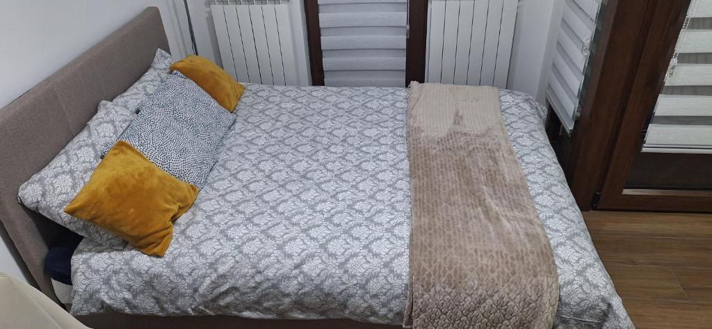 Postel nebo postele na pokoji v ubytování Apartman Dunati