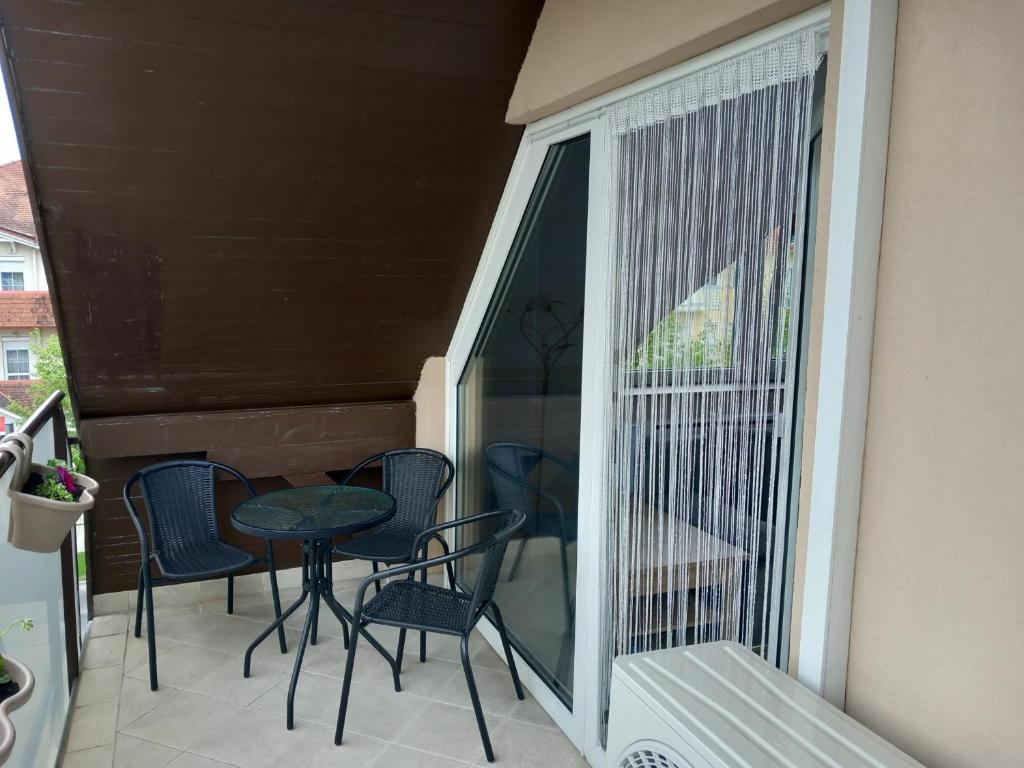 A balcony or terrace at Prime Apartment Heviz
