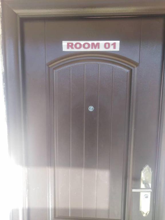 a sign over the door of a room at Marcopolo Hotel in Makurdu