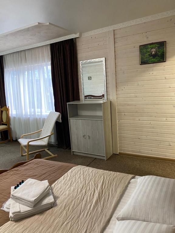 Postel nebo postele na pokoji v ubytování Guest house Shulc