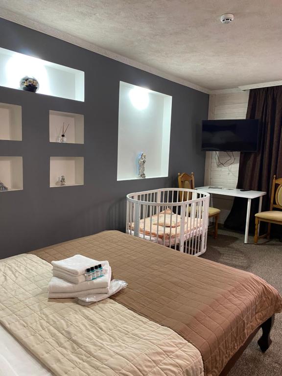 Postel nebo postele na pokoji v ubytování Guest house Shulc