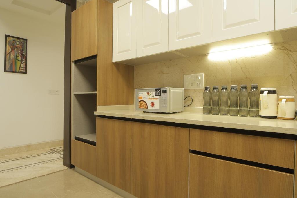 Kuchyň nebo kuchyňský kout v ubytování Under My Roof Superio