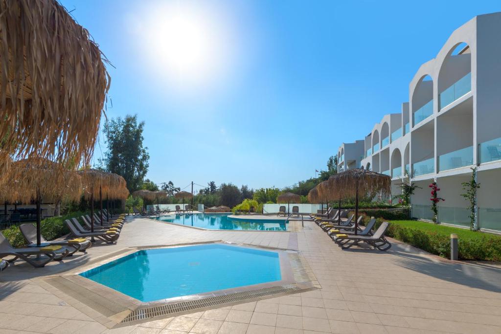 The swimming pool at or close to Lindos Breeze Beach Hotel