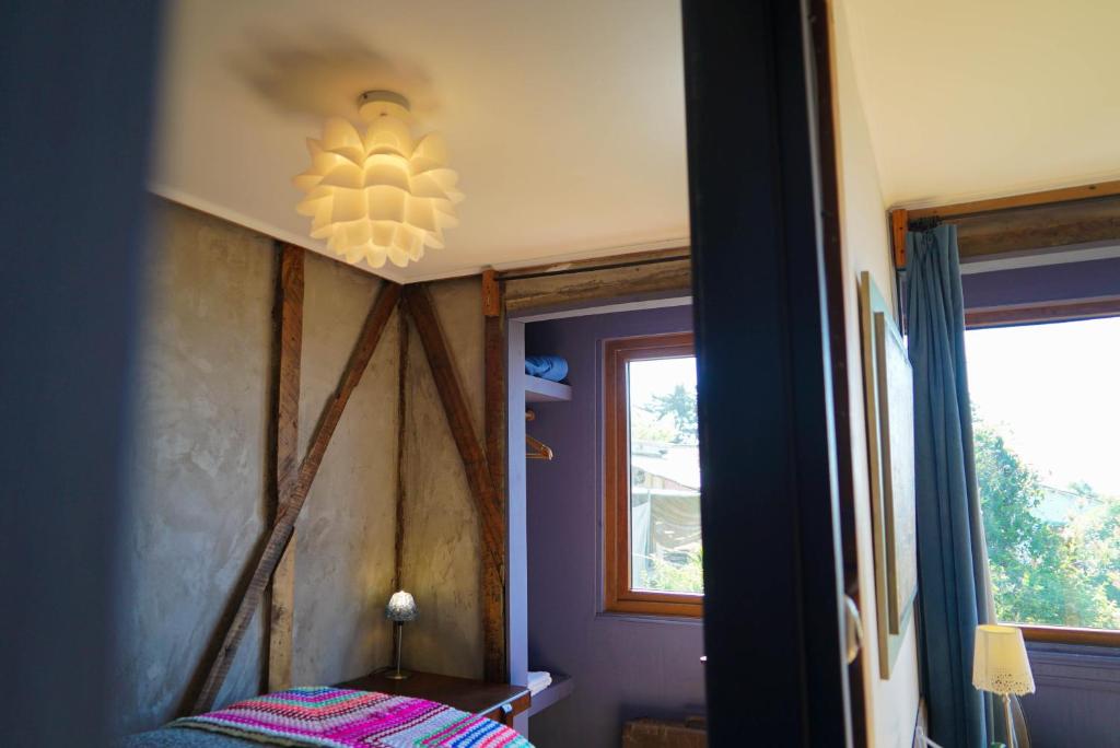 Postel nebo postele na pokoji v ubytování Patio Ferreiro B&B