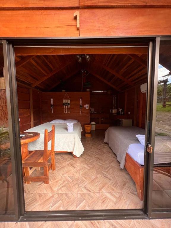 Postel nebo postele na pokoji v ubytování Cabañas SyC