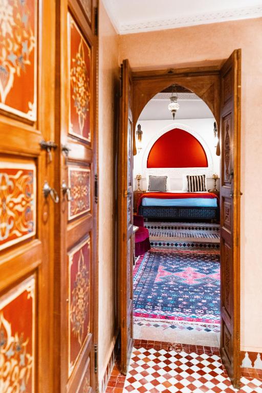 Postel nebo postele na pokoji v ubytování Riad Dar Alhambra