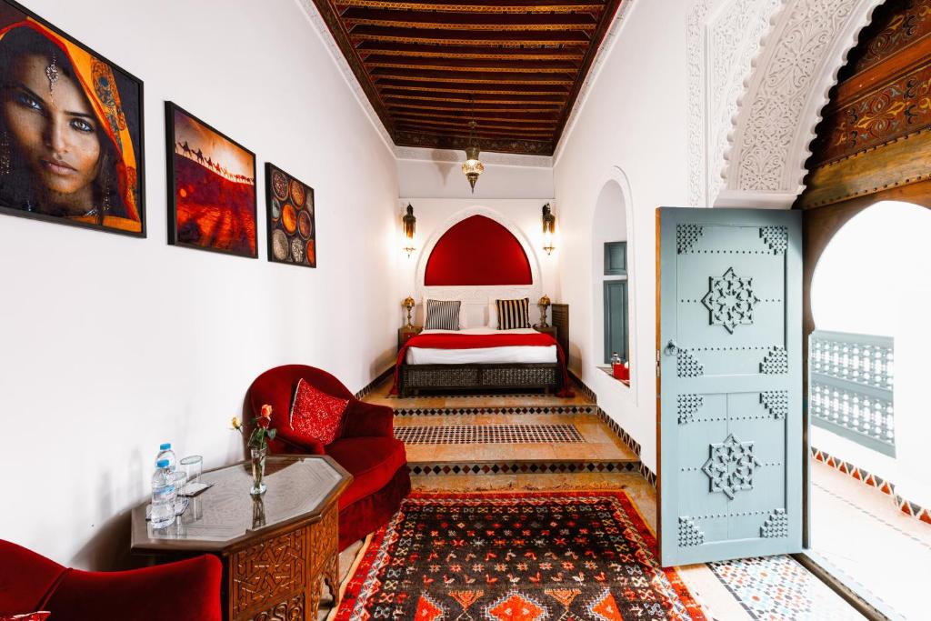 Postel nebo postele na pokoji v ubytování Riad Dar Alhambra