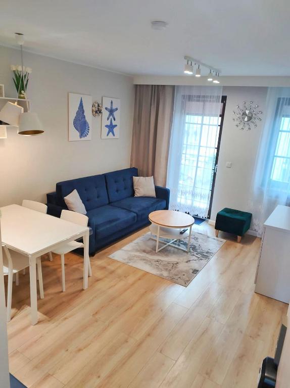 Posezení v ubytování Apartament MajGraj sąsiedztwo Parku Zdrojowego