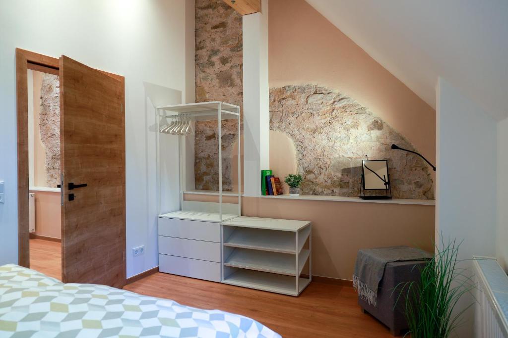 Postel nebo postele na pokoji v ubytování Neu - Wenkheimer Hof Scheunen-Loft