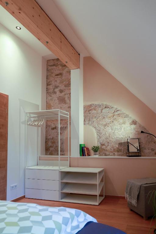 Postel nebo postele na pokoji v ubytování Neu - Wenkheimer Hof Scheunen-Loft