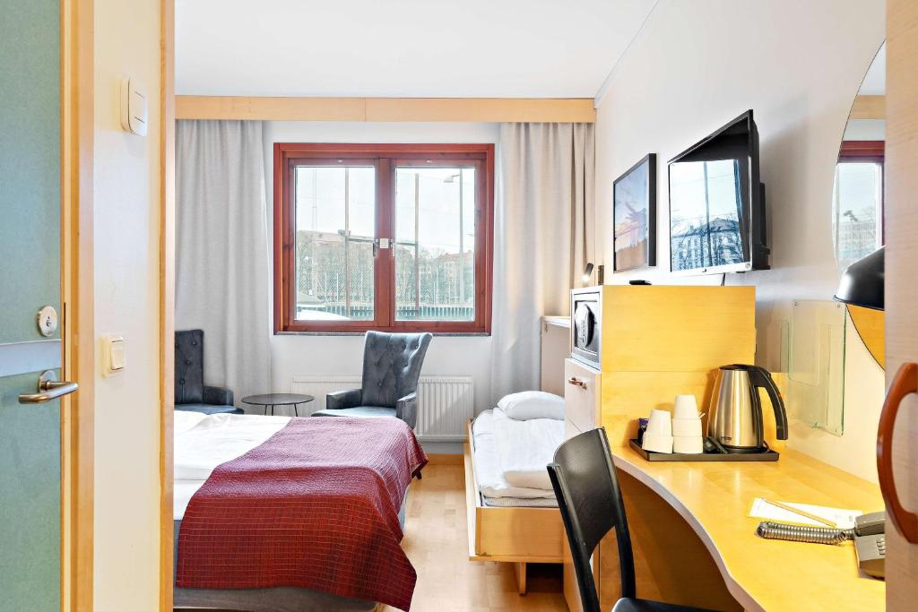 Postel nebo postele na pokoji v ubytování Hotell Heden - BW Signature Collection