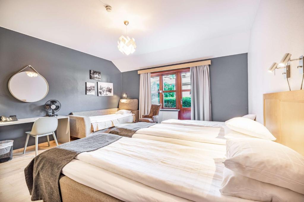 Postel nebo postele na pokoji v ubytování Hotell Heden - BW Signature Collection