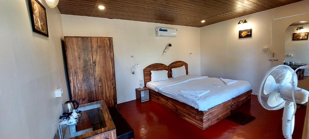 Postel nebo postele na pokoji v ubytování Ourem Palace