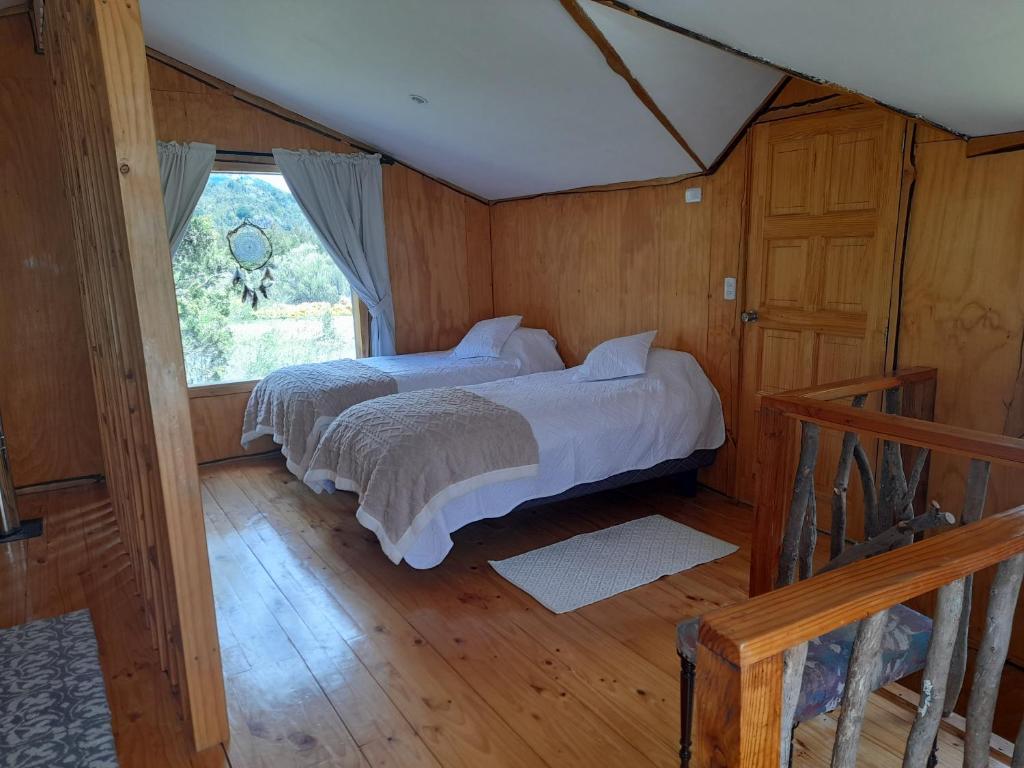 Postel nebo postele na pokoji v ubytování Cabaña Casa Morada