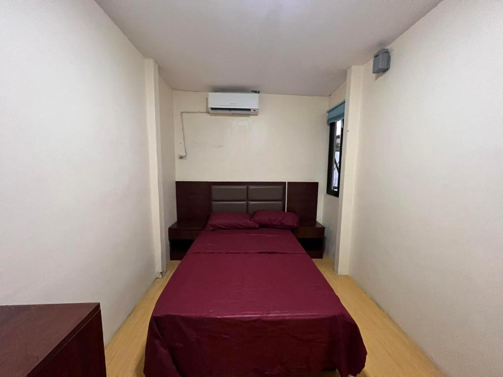 Postel nebo postele na pokoji v ubytování APARTELLE BORACAY