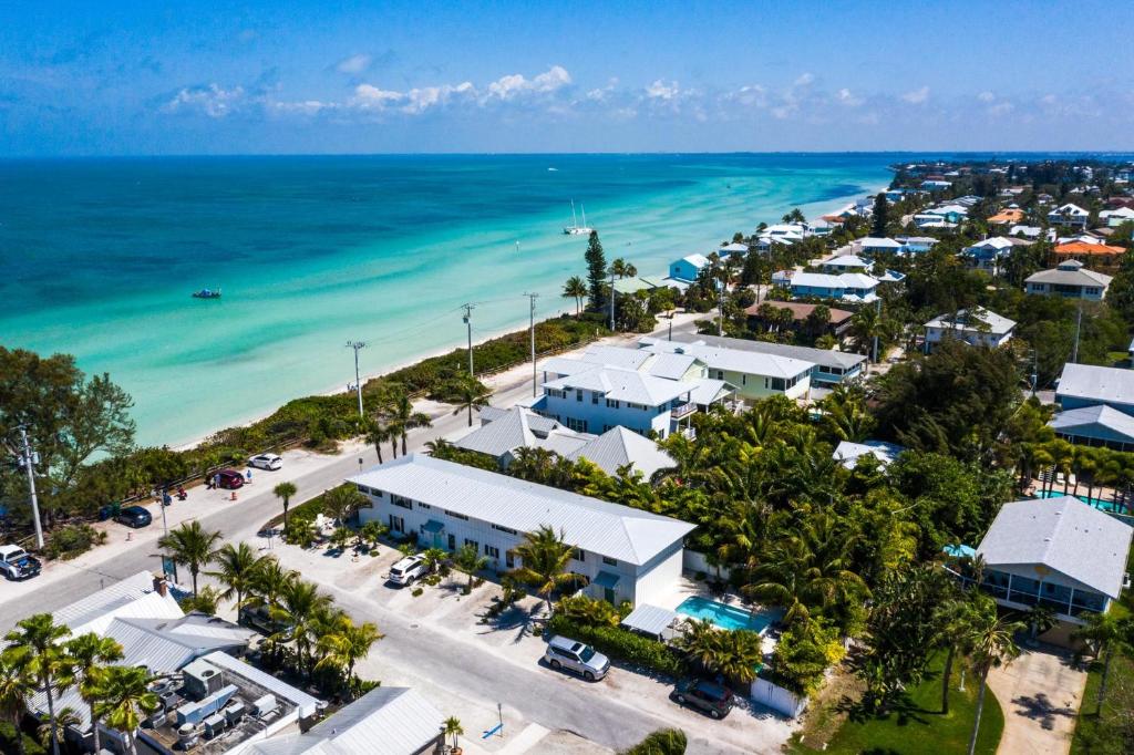 an aerial view of a resort and the ocean at Bay Breezes at Bayside Bungalow in Anna Maria