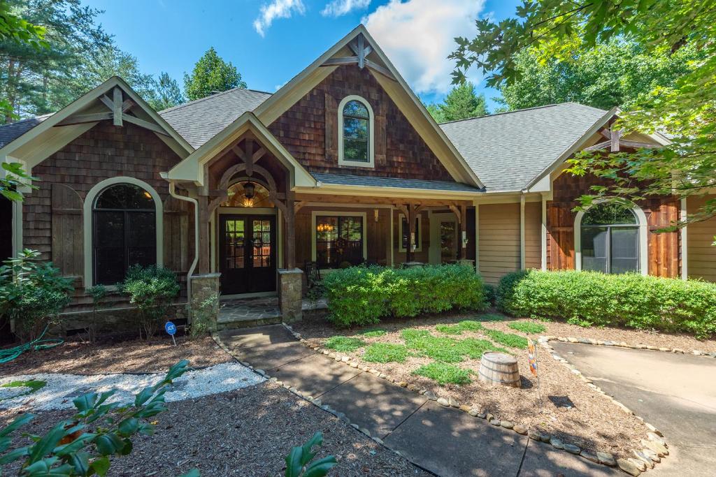 Curated visual reference: Luxury Penthouse Features Private Fire Pit And Outdoor Game Room Reference: Sweet Spot On Lake James Luxury Home With Private Dock