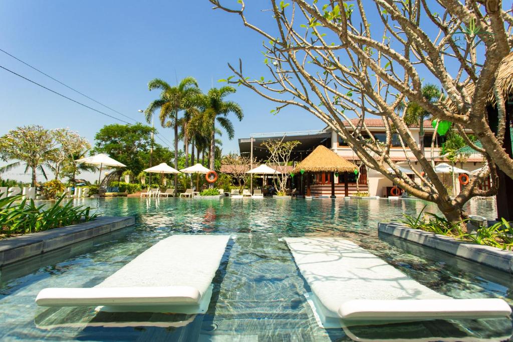 Bazén v ubytování Silk Sense Hoi An River Resort - A Sustainable Destination nebo v jeho okolí