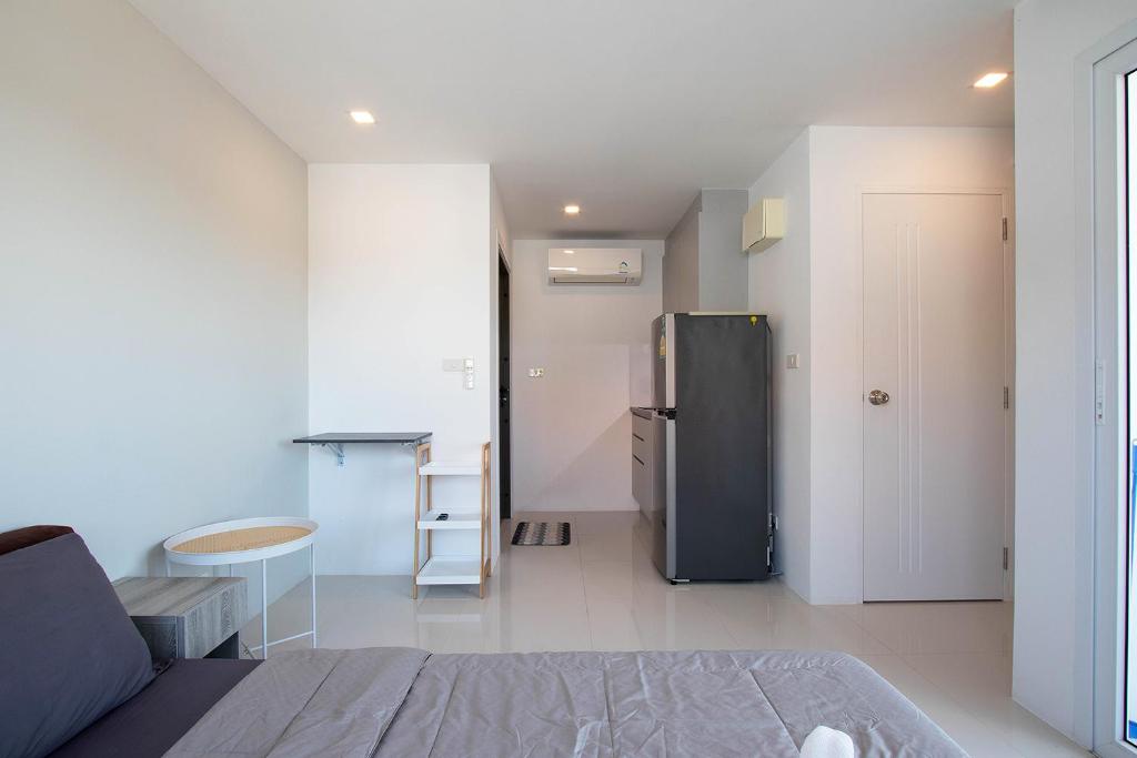 Kuchyň nebo kuchyňský kout v ubytování Mantra Beach condominium By AProperty
