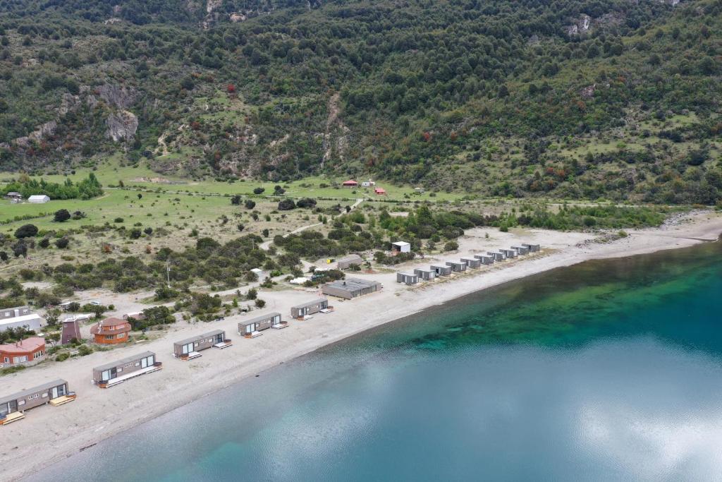 an aerial view of a beach and the water at Chelenko Lodge in Puerto Tranquilo