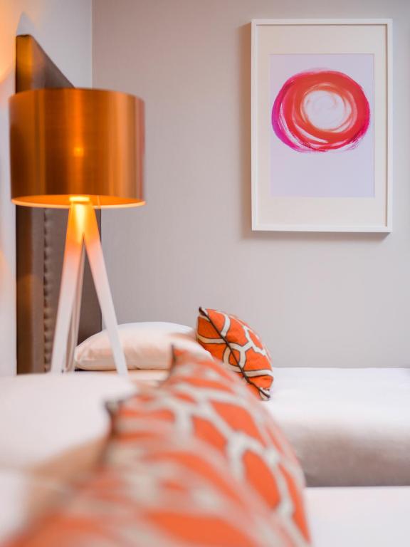 Voodi või voodid majutusasutuse Meadowlands Hotel toas