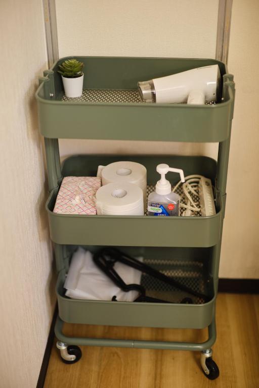 Palanda nebo palandy na pokoji v ubytování TORA HOTEL Tokyo Ueno 寅ホテル 上野 A