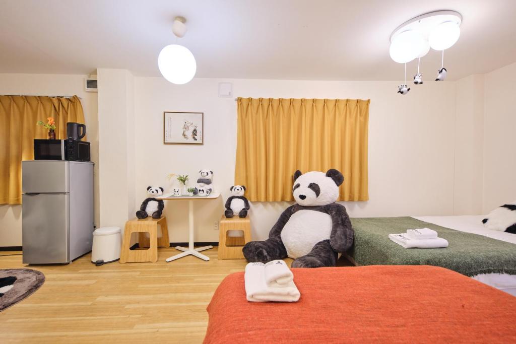 Postel nebo postele na pokoji v ubytování TORA HOTEL Tokyo Ueno 寅ホテル 上野 A