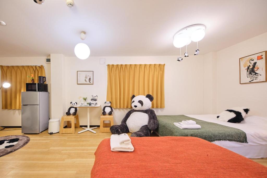 Postel nebo postele na pokoji v ubytování TORA HOTEL Tokyo Ueno 寅ホテル 上野 A