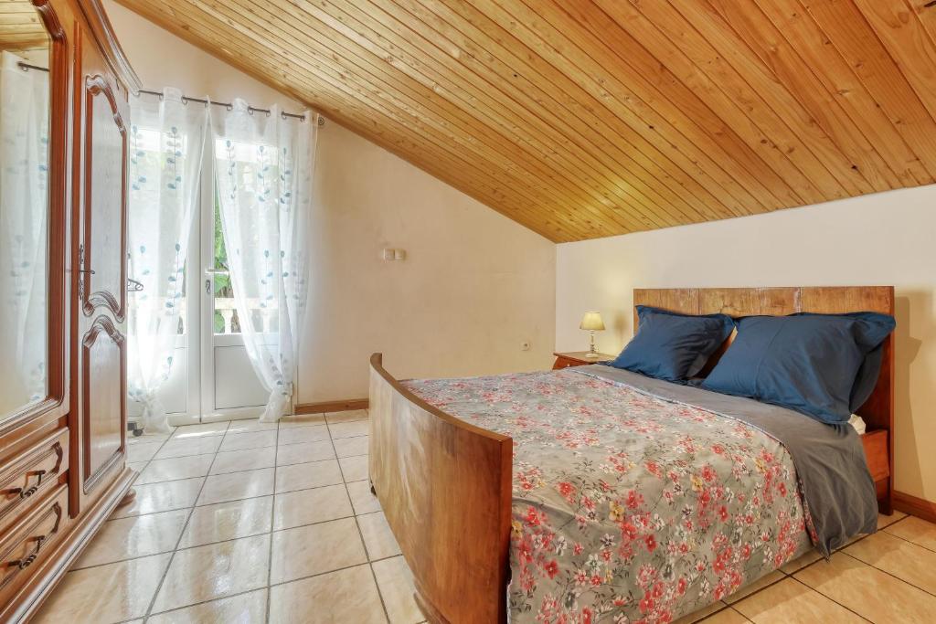 Postel nebo postele na pokoji v ubytování le paradis d'Elise