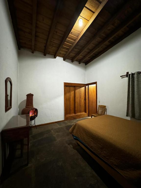 Postel nebo postele na pokoji v ubytování Los Azufres Spa Natural