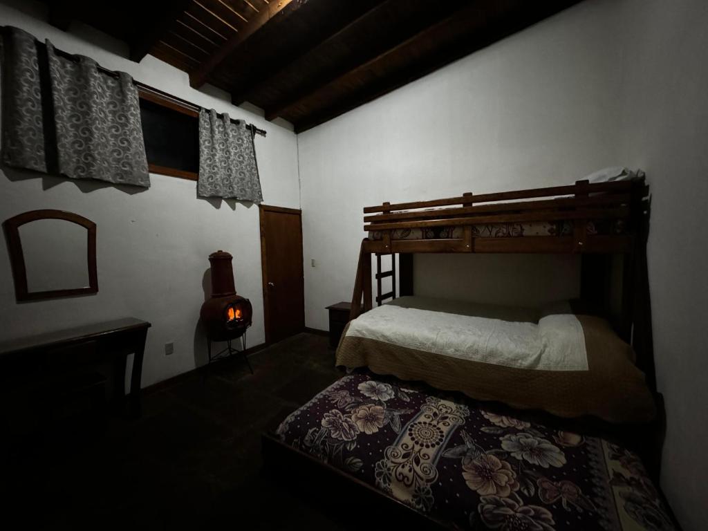 Postel nebo postele na pokoji v ubytování Los Azufres Spa Natural