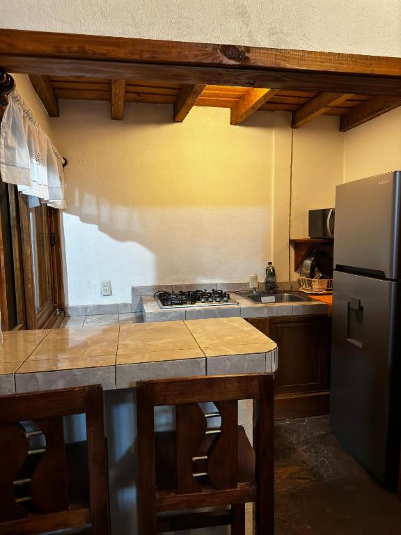 Kuchyň nebo kuchyňský kout v ubytování Los Azufres Spa Natural