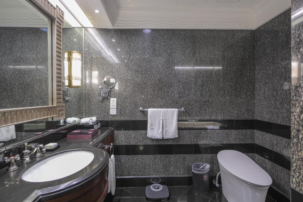 Koupelna v ubytování Jin Jiang Hotel