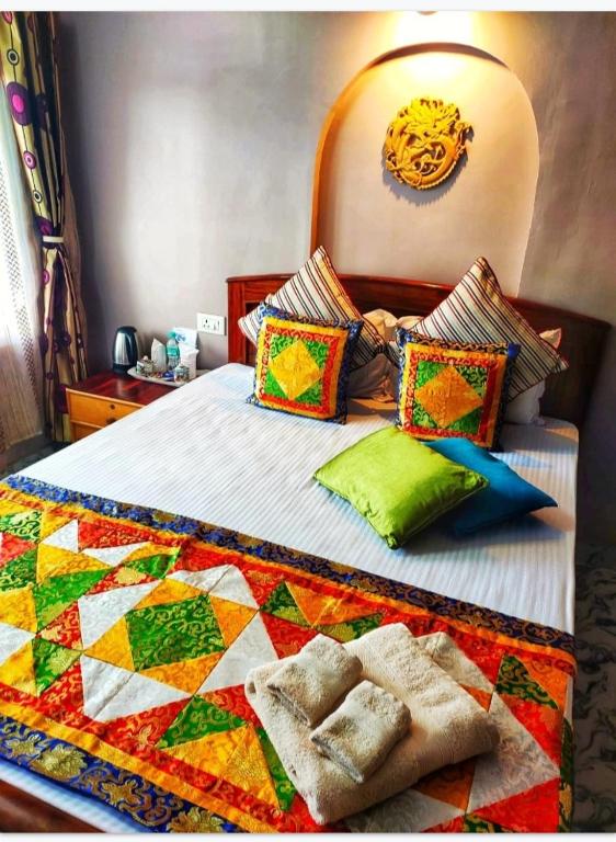 Postel nebo postele na pokoji v ubytování Mysa Homestays