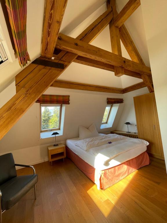Postel nebo postele na pokoji v ubytování Parkforum Wylihof