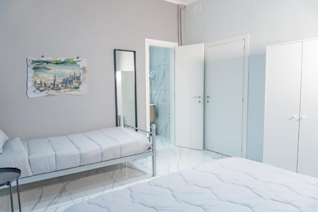 Postel nebo postele na pokoji v ubytování Hostel Partenope