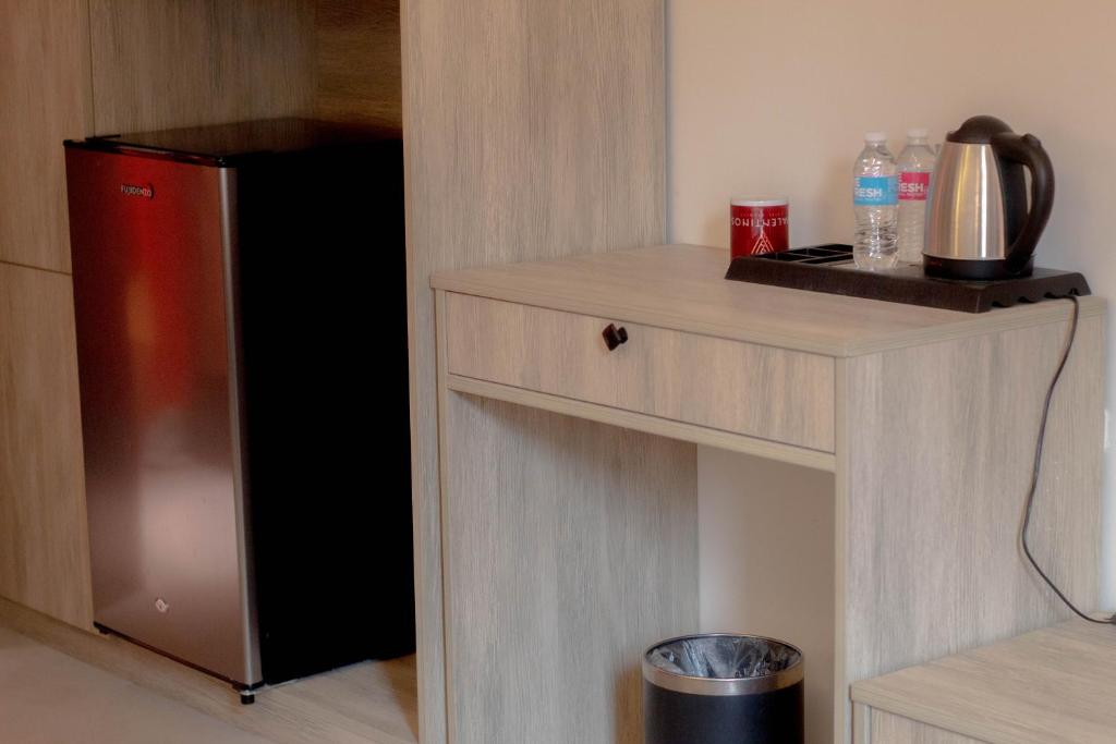 Kuchyň nebo kuchyňský kout v ubytování Valentino's Hotel