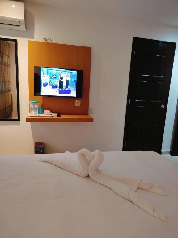 Postel nebo postele na pokoji v ubytování One Dream Hotel