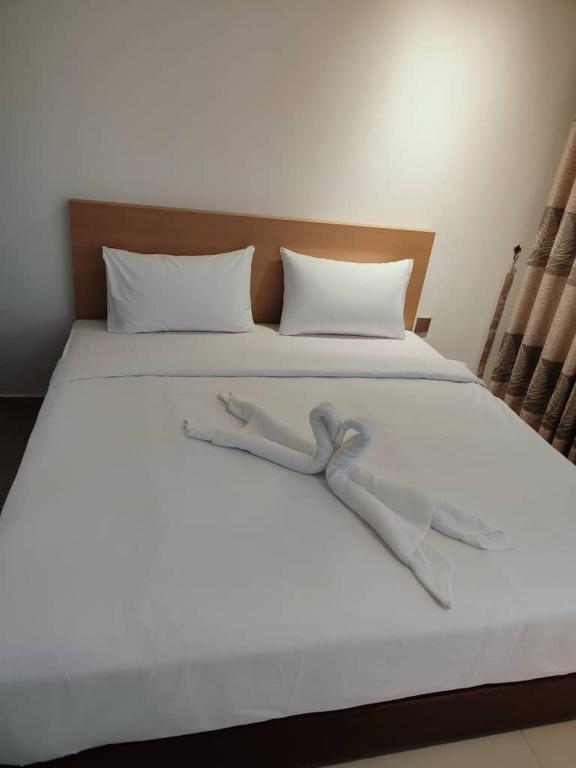 Postel nebo postele na pokoji v ubytování One Dream Hotel