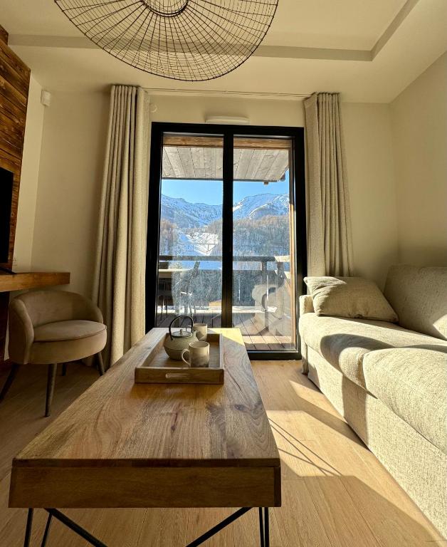 Photo de la galerie de l'établissement Appartement au pieds des pistes, à Auron