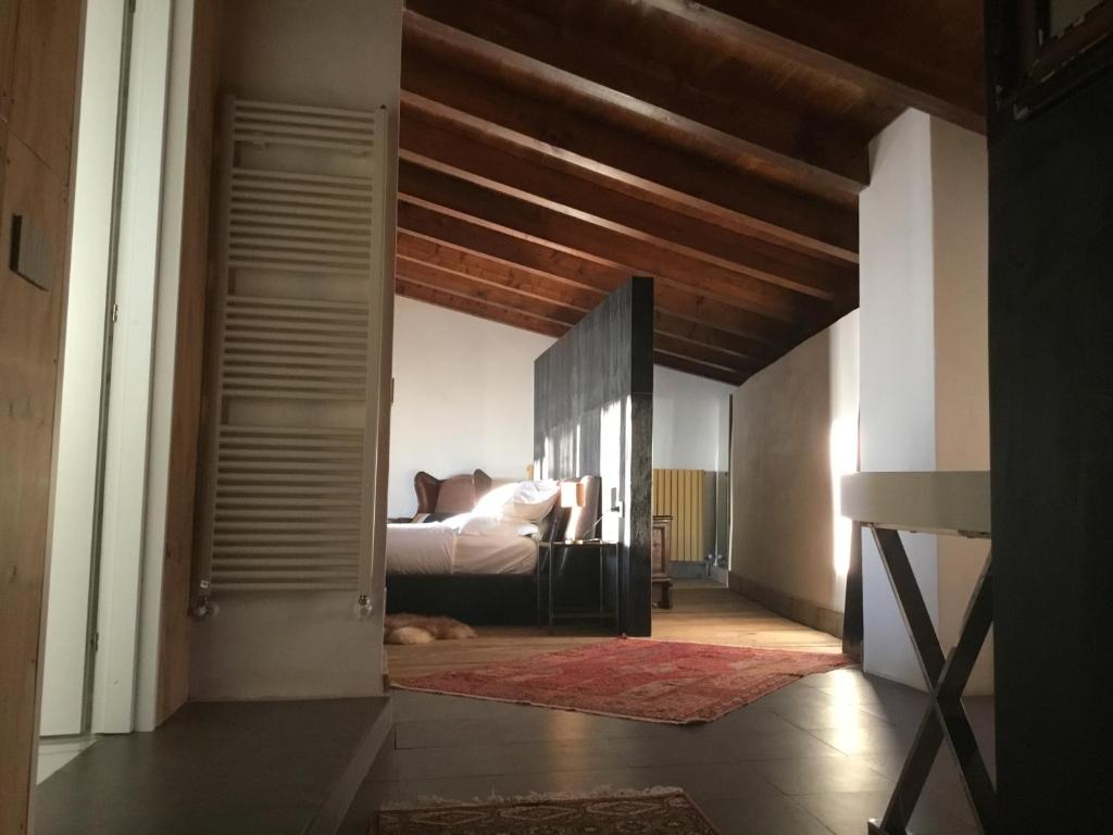 Postel nebo postele na pokoji v ubytování B&B con SPA il Castello di Lucawest
