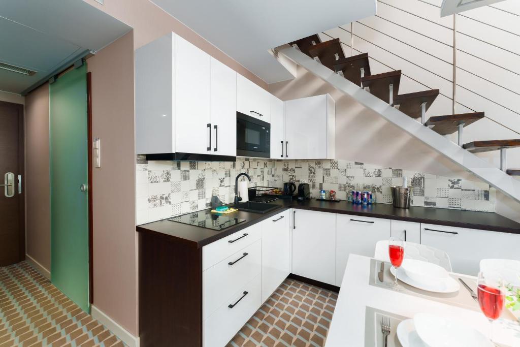 Kuchyňa alebo kuchynka v ubytovaní Apartamenty Almar Marine