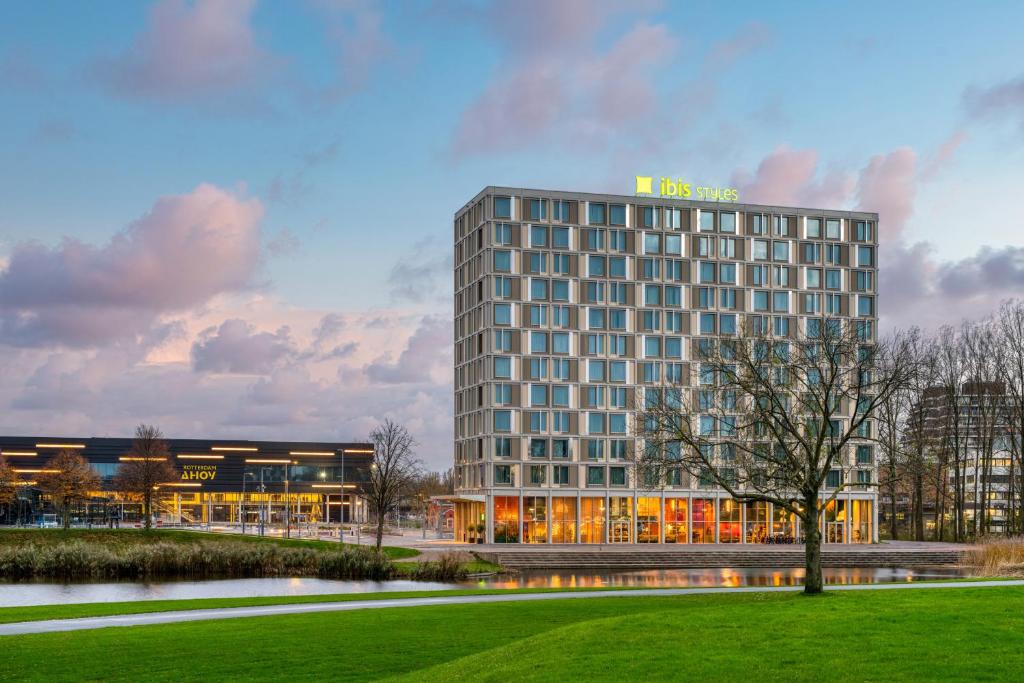 a rendering of a hotel building with a park at ibis Styles Rotterdam Ahoy in Rotterdam