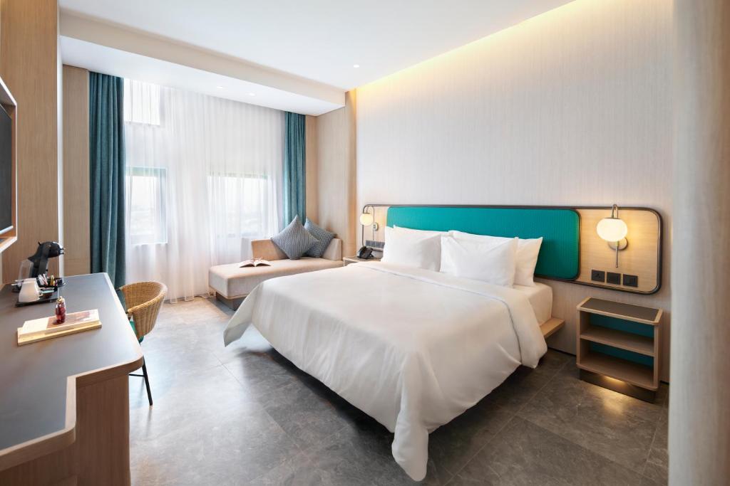 Voodi või voodid majutusasutuse VIVERE Hotel, ARTOTEL Curated toas