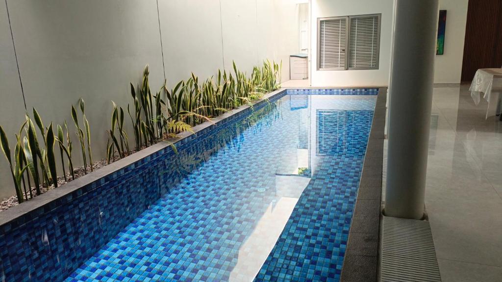 Πισίνα στο ή κοντά στο Villa Syariah Bandung Banget