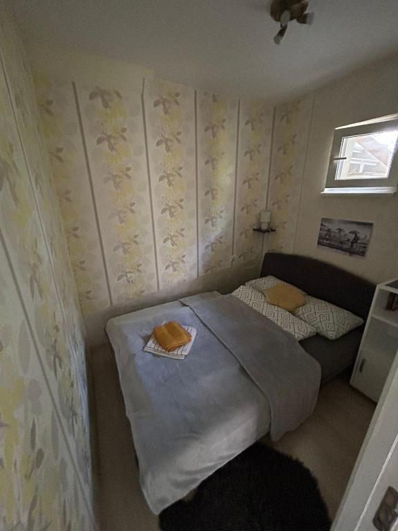 Postel nebo postele na pokoji v ubytování Apartmani Trio